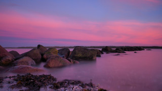 Pink sky water rocks mountains - rock free wallpaper
