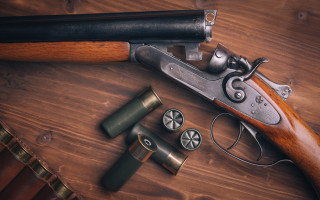 Gun shotguns lighter serial art - a table top free wallpaper