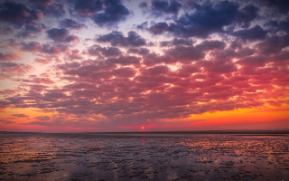 Sunset clouds boat beach person - rich moody colour free wallpaper