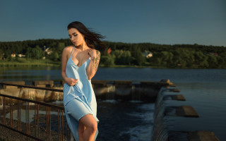Woman blue dress lake fence - a lake in the background free wallpaper