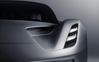 Tail light shiny silver car - symmetrical feature free wallpaper