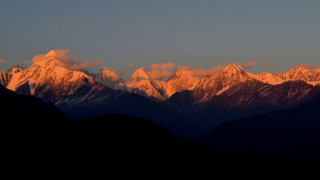 Mountain range sunset clouds fire - a sunset in the background free wallpaper