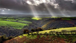 Valley green hills trees sunbeam - a view of a valley free wallpaper