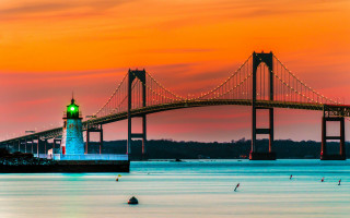 Bridge lighthouse dusk redsky cityscape - american romanticism free wallpaper