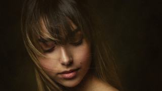 Woman longhair looking down cellphone - she free wallpaper