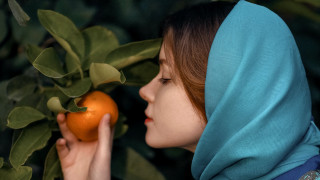 Woman blue scarf orange smile - a blue scarf free wallpaper