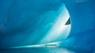 Blue ice cave boat ocean - a boat free wallpaper for desktop
