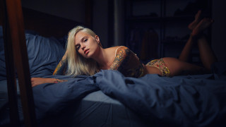 Woman bed tattoo blonde blue - her arm and chest free wallpaper