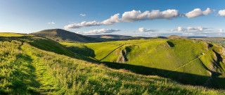 Grassy hill panorama tiltshift nature - a few hill free wallpaper