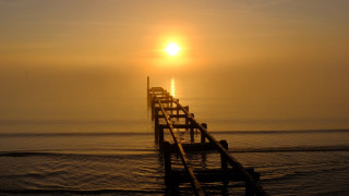 Pier bench sunset boat ocean - a pier free wallpaper for desktop