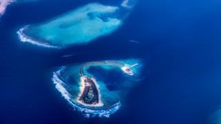 Aerial island plane landing blue - aerial view free wallpaper