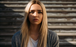 Woman blonde hair serious look 2 - long blonde hair free wallpaper