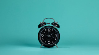 Black alarm clock blue green - a black clock free wallpaper