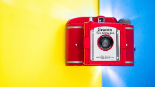 Red camera yellow blue wall 2 - background behind free wallpaper