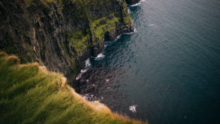 Cliff water grassy forest night - a cliff face free wallpaper