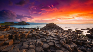 Sunset rocky beach large formation - free sunset wallpaper