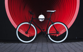 Bicycle red wall circular window - a bicycle free wallpaper