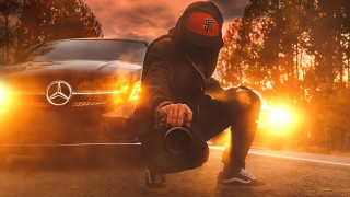 Hoodie man crouching car autumn - a hood free wallpaper for desktop