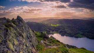 Lake mountains hilltop cloudy sky - a view of a lake and mountains free wallpaper