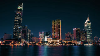 City skyline night water bridge 9 - a lit up free wallpaper