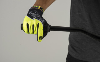 Man holding gloves cobra product - a black handle free wallpaper