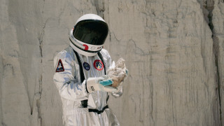 Astronaut glove rockwall spaceart marble - a man in a space suit holding free wallpaper