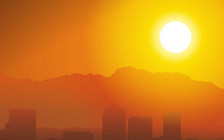 City skyline mountains sunset silhouette - hazy free wallpaper
