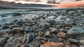 Rocky beach sunset clouds shore - a rocky beach free wallpaper