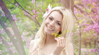 Woman flower hair portrait cherry - a picture in front free wallpaper for desktop