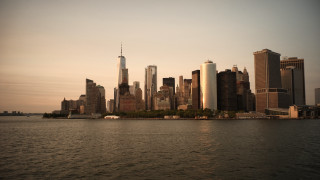 Cityscape boat sunset bridge castle - a boat in the foreground free wallpaper for desktop