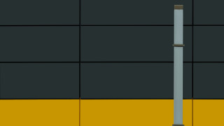 Tall pole yellow wall clock - a yellow wall free wallpaper