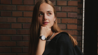 Elina Karimova BlackDress LongHair BrickWall - the side with free wallpaper