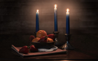 Fruit candles stilllife table art - a bowl of fruit free wallpaper