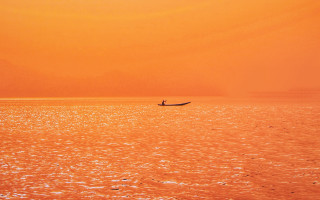 Boat person in foreground sunset - sunrise free wallpaper for desktop
