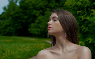 Woman closed eyes field nature - head and shoulders portrait free wallpaper for desktop