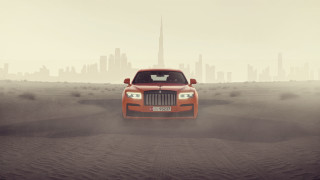 Red car desert city fog - dust free wallpaper