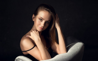 Elina karimova portrait sitting black - a chair free wallpaper