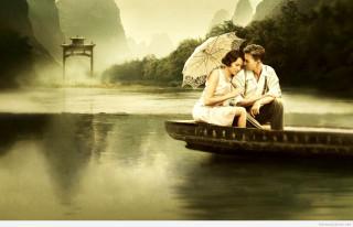 Couple boat water umbrella sitting - a couple sitting free wallpaper