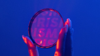 Person holding magnifyingglass no more - elsa bleda free wallpaper