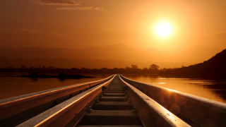 Train water sunset mountain city - a train track free wallpaper