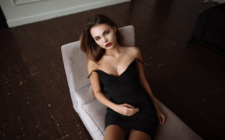 Elegant woman black dress white 2 - a white couch free wallpaper