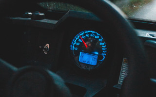 Car dashboard speedometer red needle - a car dashboard free wallpaper for desktop