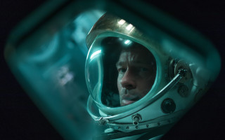 Man space suit earth sky - free space wallpaper