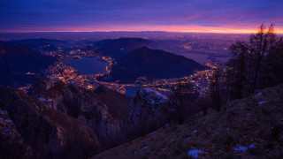 Mountain city night purple sky - a view of a city free wallpaper
