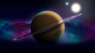 Saturn rings stars sky sun - a bright sun in the background free wallpaper for desktop
