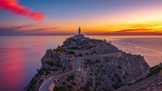 Lighthouse cliff ocean sunset red - winding free wallpaper