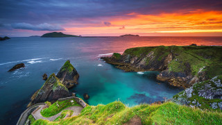 Sunset coastline path island ocean - a small island in the distance free wallpaper