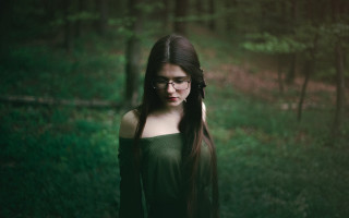 Woman glasses forest green top - long hair and a ponytail free wallpaper