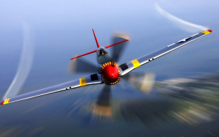 Small airplane over water sky - a small airplane free wallpaper for desktop