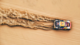 Desert car dust sand dunes - a car driving free wallpaper